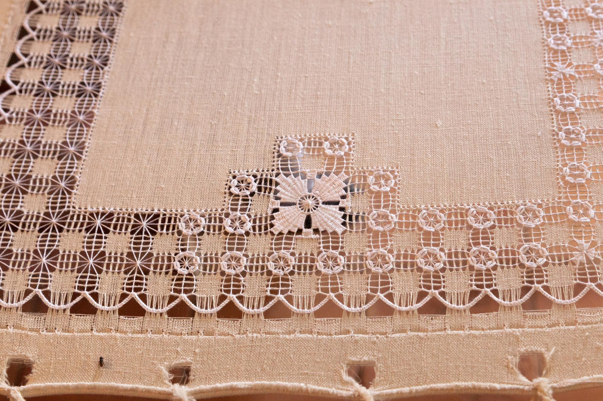 embroidered linen towel with geometric border